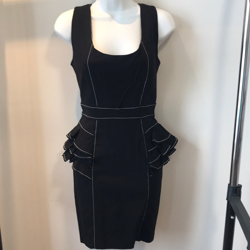 Bebe mechanical fabric peplum dress.